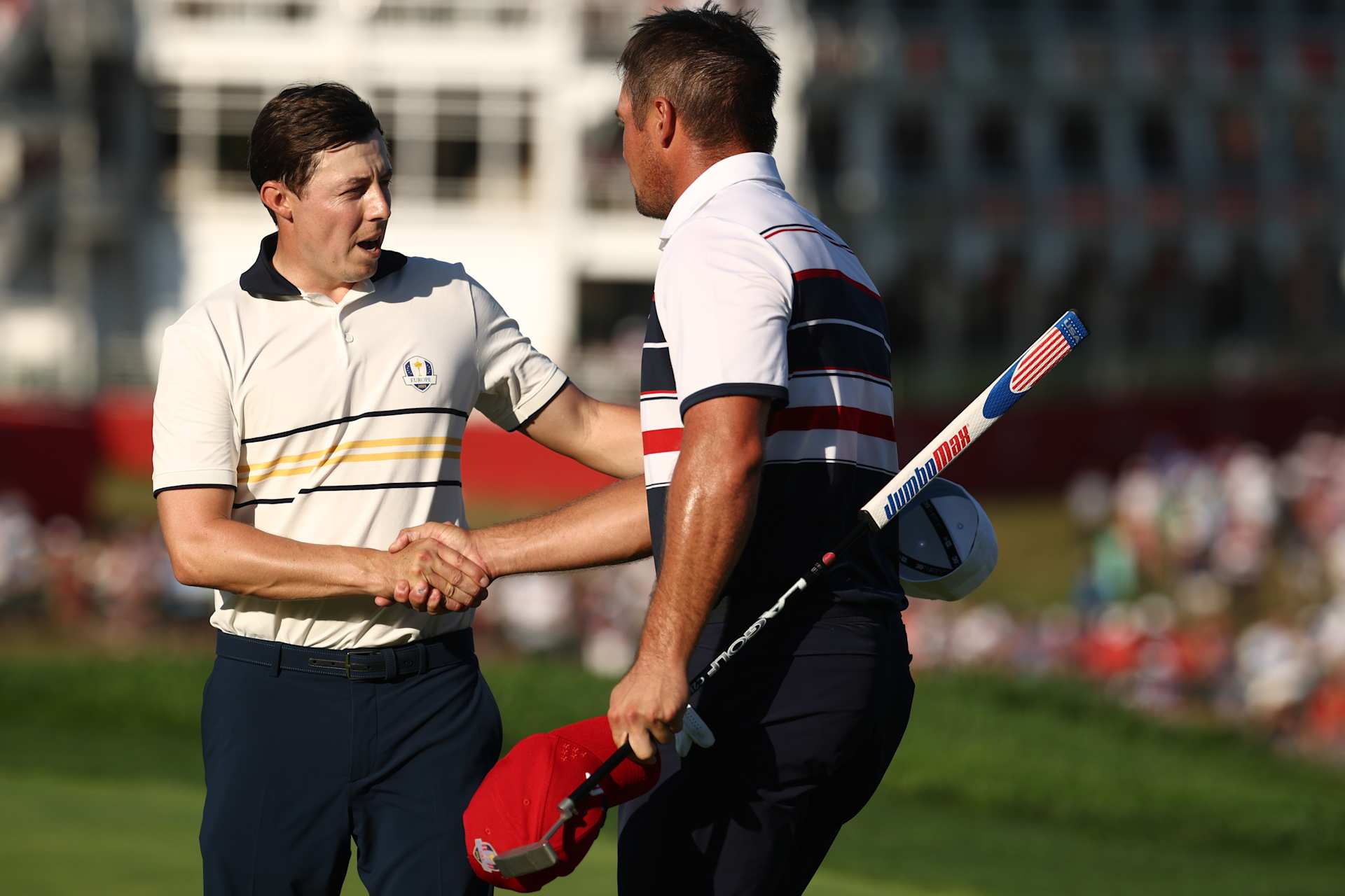 FARMINGDALE, NEW YORK - SEPTEMBER 28: (L-R) Matt Fitzpatrick of Team Europe and Bryson DeChambeau of Team United States shake hands on the 18th green after halving their match during the Sunday singles matches of the 2025 Ryder Cup at Black Course at Bethpage State Park Golf Course on September 28, 2025 in Farmingdale, New York. (Photo by Jared C. Tilton/Getty Images)