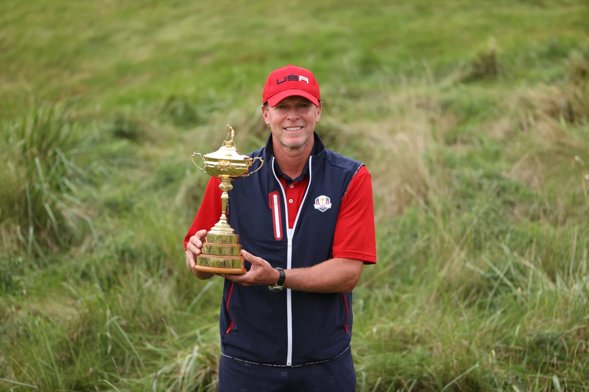 KOHLER, WISCONSIN - SEPTEMBER 26: Captain Steve Stricker of team United States celebrates with the Ryder Cup after Team United States defeated Team Europe 19 to 9 in the 43rd Ryder Cup at Whistling Straits on September 26, 2021 in Kohler, Wisconsin. (Photo by Patrick Smith/Getty Images)
