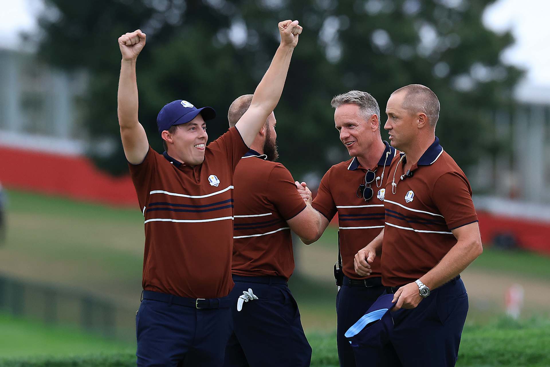 FARMINGDALE, NEW YORK - SEPTEMBER 27:  Matt Fitzpatrick & Tyrrell Hatton of Europe celebrate on the 18th green with Team Europe Captain Luke Donald & Alex Noren during the Saturday afternoon four-balls matches of the 2025 Ryder Cup at Black Course at Bethpage State Park Golf Course on September 27, 2025 in Farmingdale, New York. (Photo by David Cannon/Getty Images)